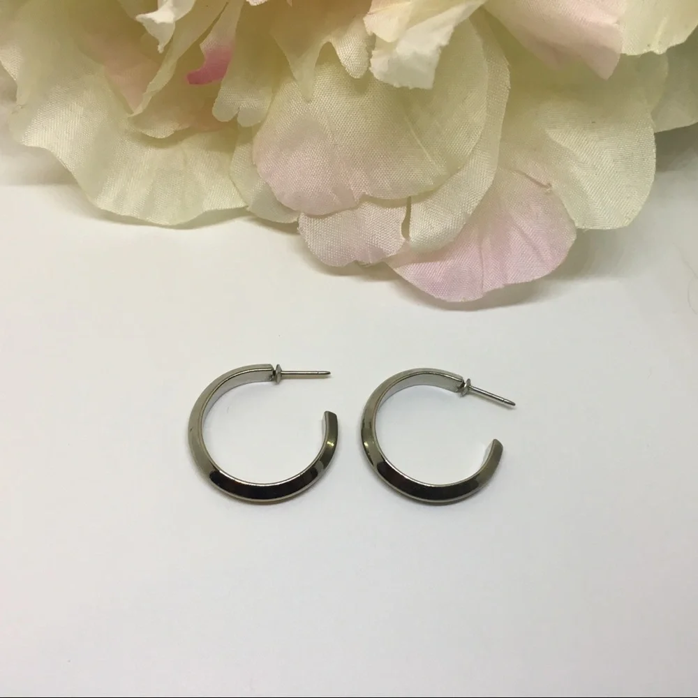 Silver colored stud hoop earrings minimal